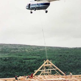 Yokanga Fly Fishing Lodge - Helicopter Setting Truss In Place