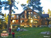 Cascade Handcrafted Log Homes - 3367 Edwards - Rear Corner Deck Actual View